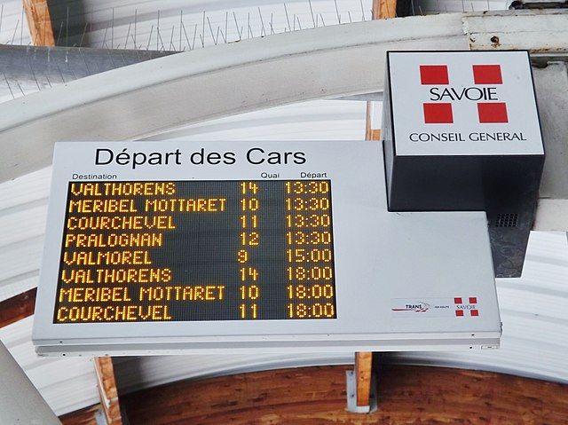 Departure boards showing bus times to Val Thorens