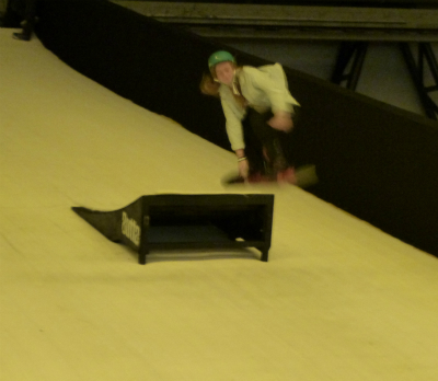 Jump London Ski and Snowboard show, a snowboarder jumping