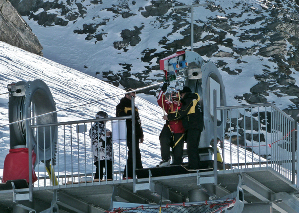 Strapping in to the zip wire in Val Thorens